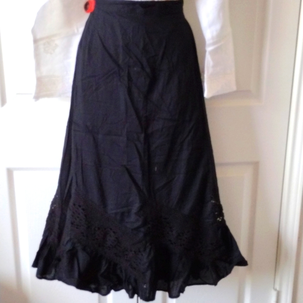 Elegant black skirt with crochet detailing very feminine and versatile piece